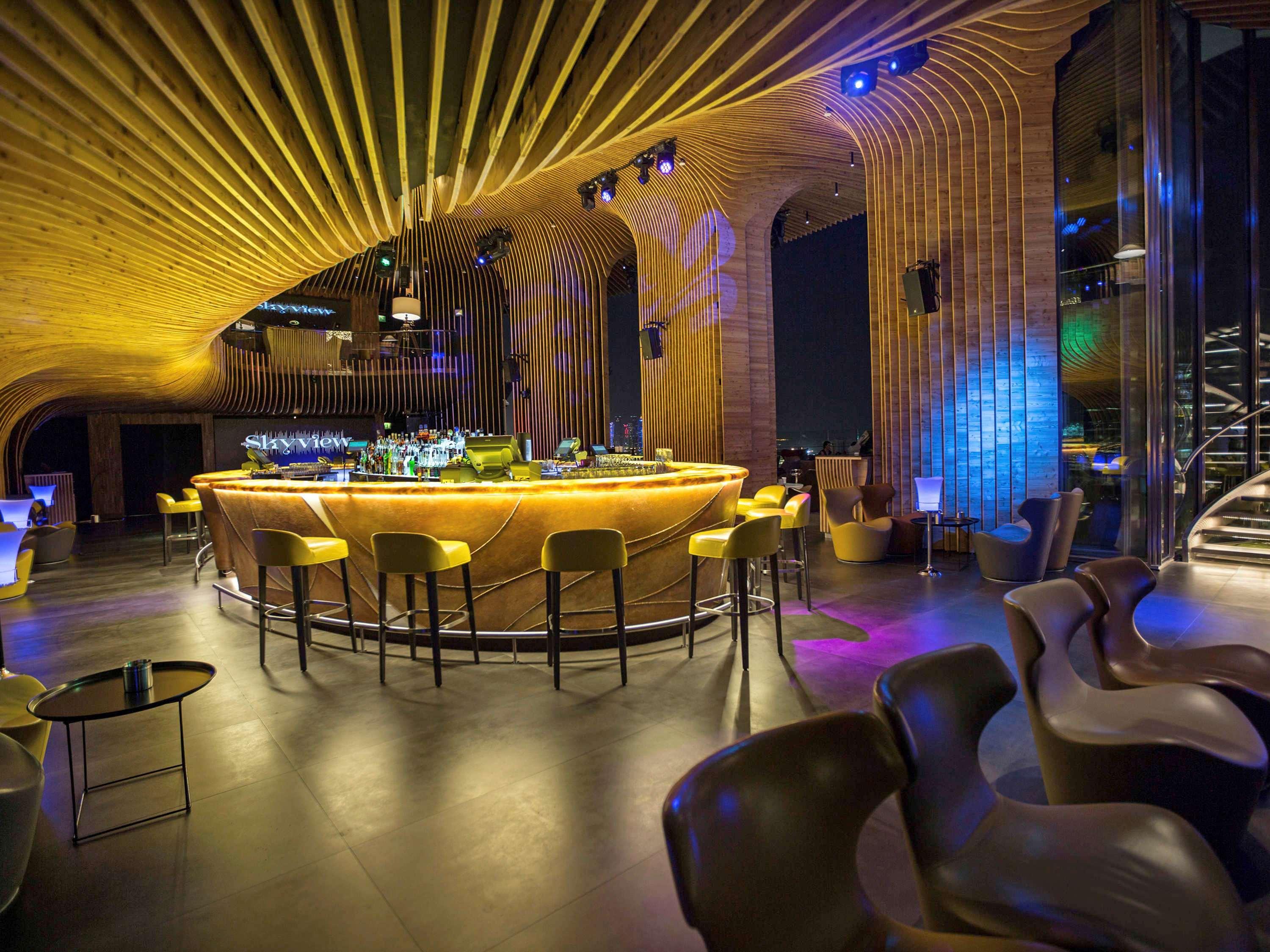 La Cigale Hotel Managed By Accor Doha Exterior foto The bar at the nightclub