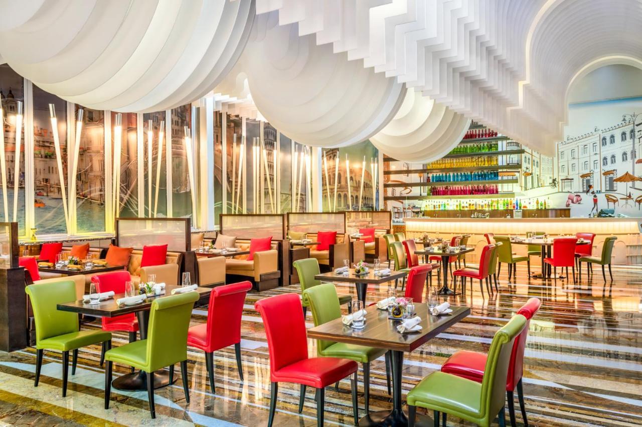 La Cigale Hotel Managed By Accor Doha Exterior foto The interior of the restaurant