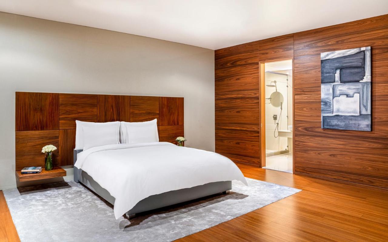 La Cigale Hotel Managed By Accor Doha Exterior foto A bedroom at the hotel